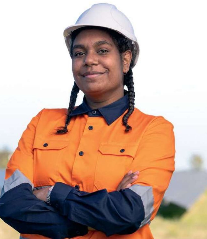 Patji Kurnu team member in high-vis workwear and hard hat